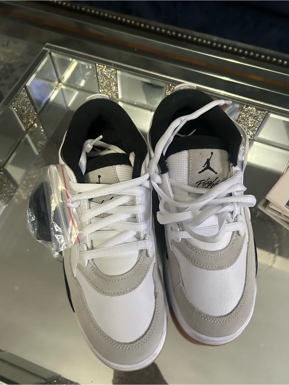 Jordan Kids White, Gray and Black Retro Sneakers
No box